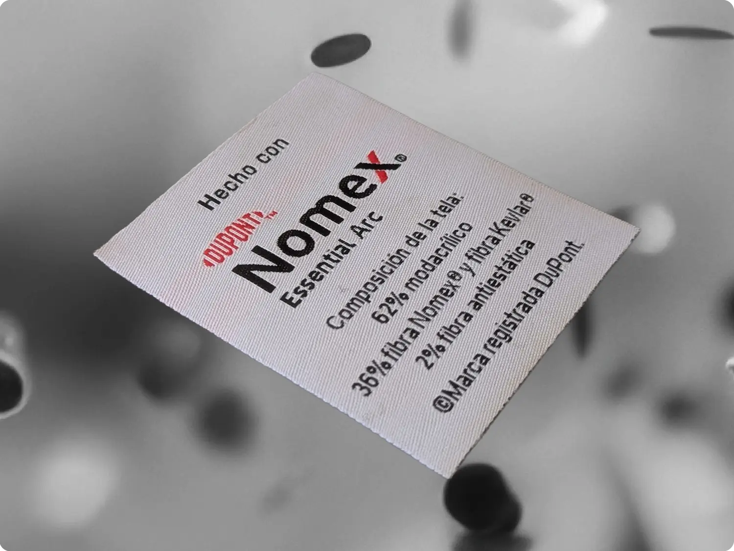 Etiqueta Bordada de la Marca Nomex by Dupont.